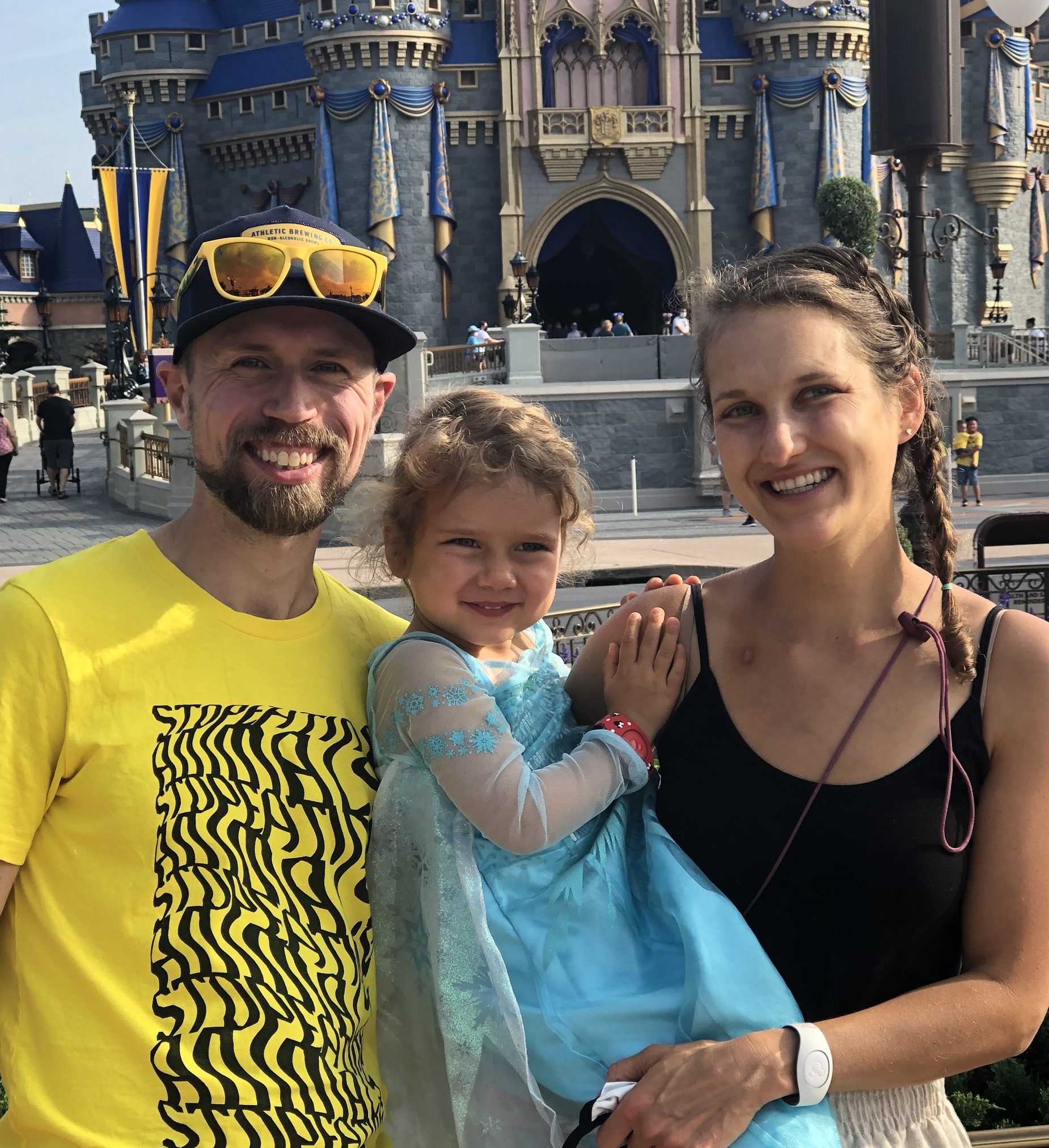 Vegan Family in Disney World in front of Cinderella's Castle