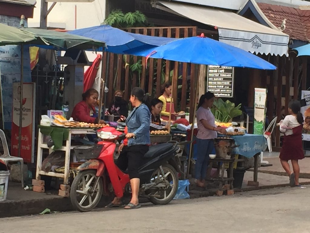 Eat vegan travel food by shopping at a local market like this one