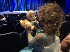 Preschooler waiting for Hollywood Studio's Frozen Sing A Long to begin
