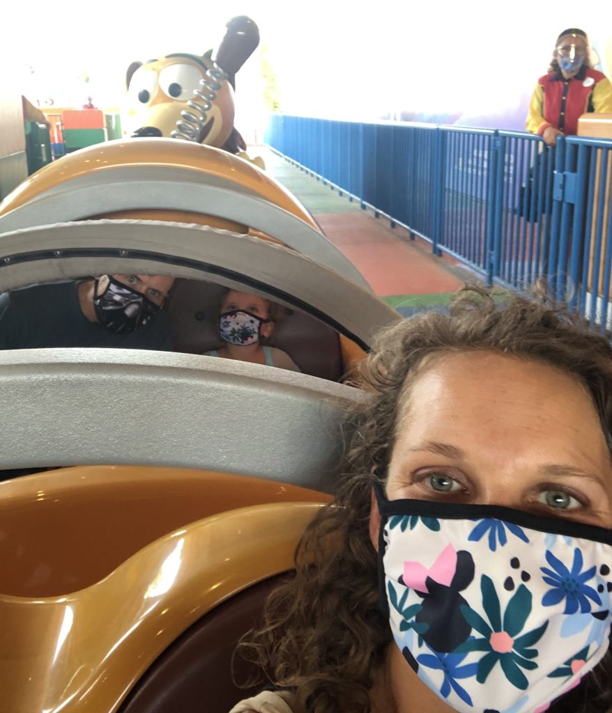 Preschooler and her parents on Hollywood Studio's Slinky Dog Dash Roller Coaster