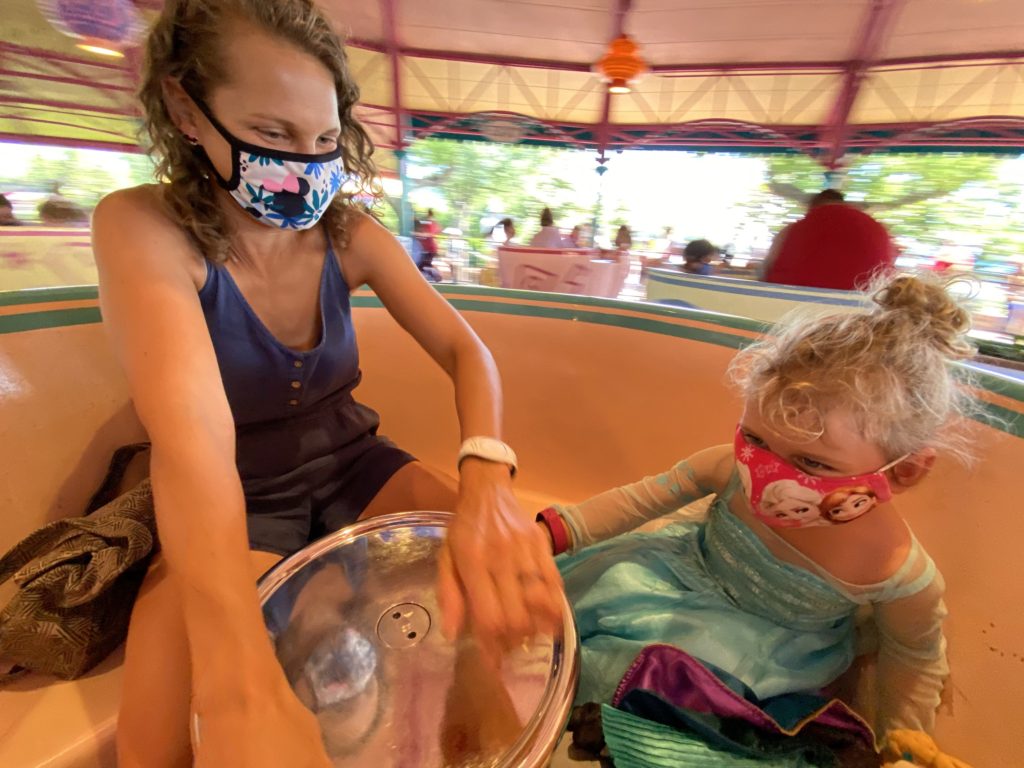 Spin on the Teacups in the Magic Kingdom with a toddler