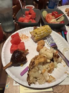 corn, watermelon, vegan ribs, and tater tots at roundup rodeo