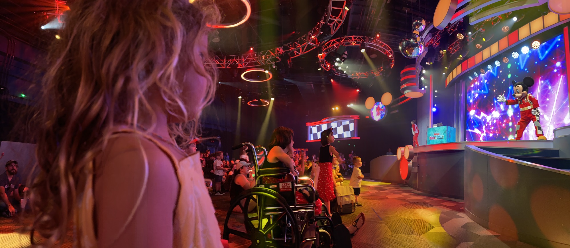 A child watching Mickey at the Disney Junior Dance Party - A perfect show for toddlers at Hollywood Studios in Disney World
