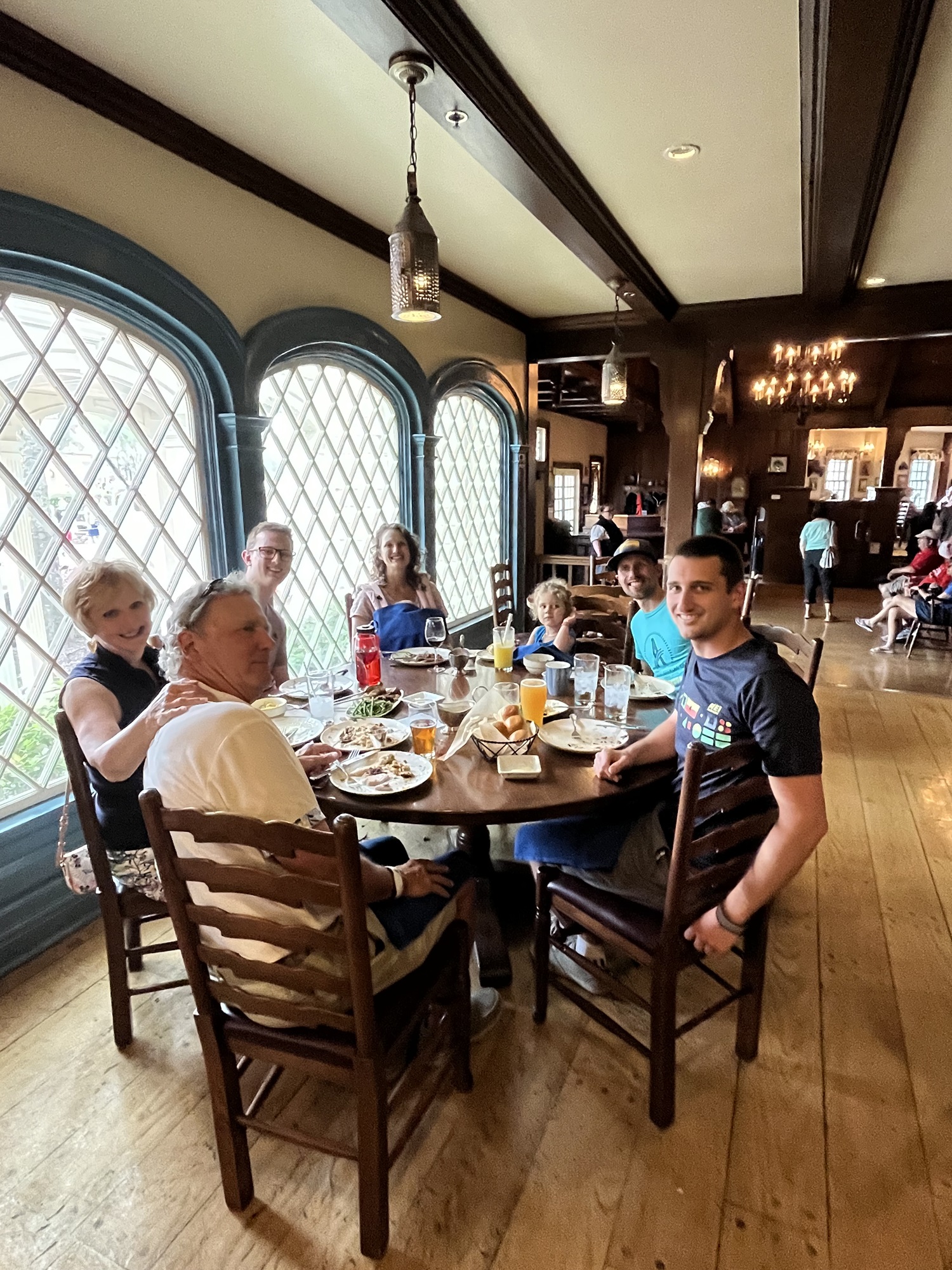 Family eating at Liberty Tree Tavern in Magic Kingdom