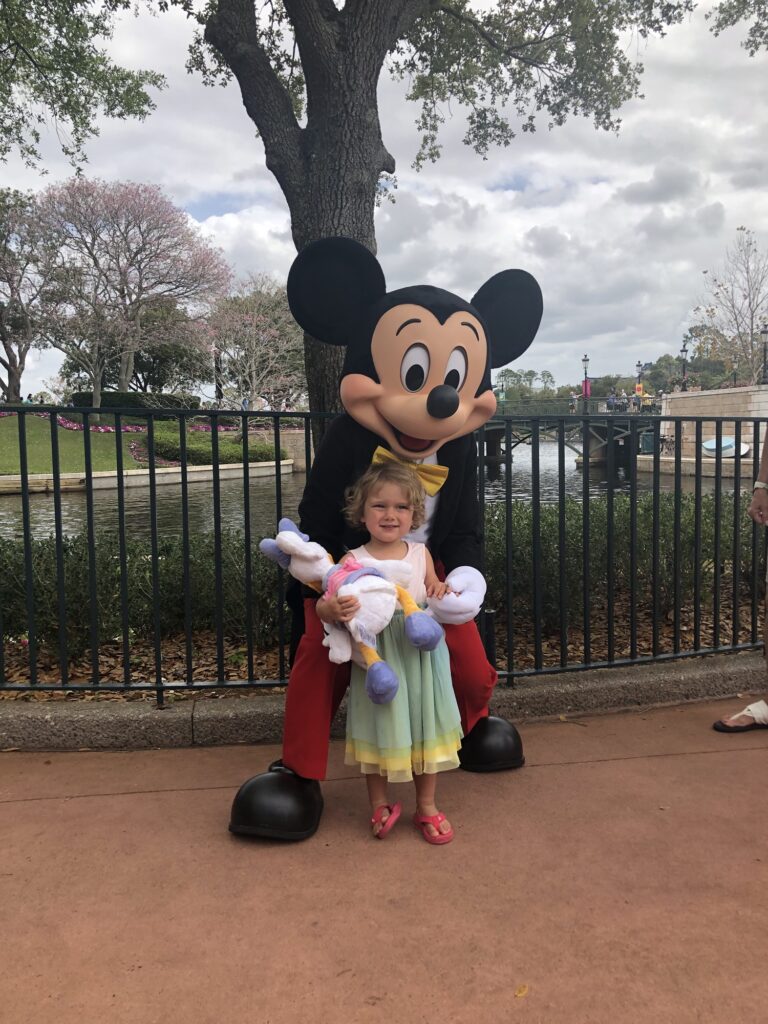 Toddler meets Mickey in EPCOT