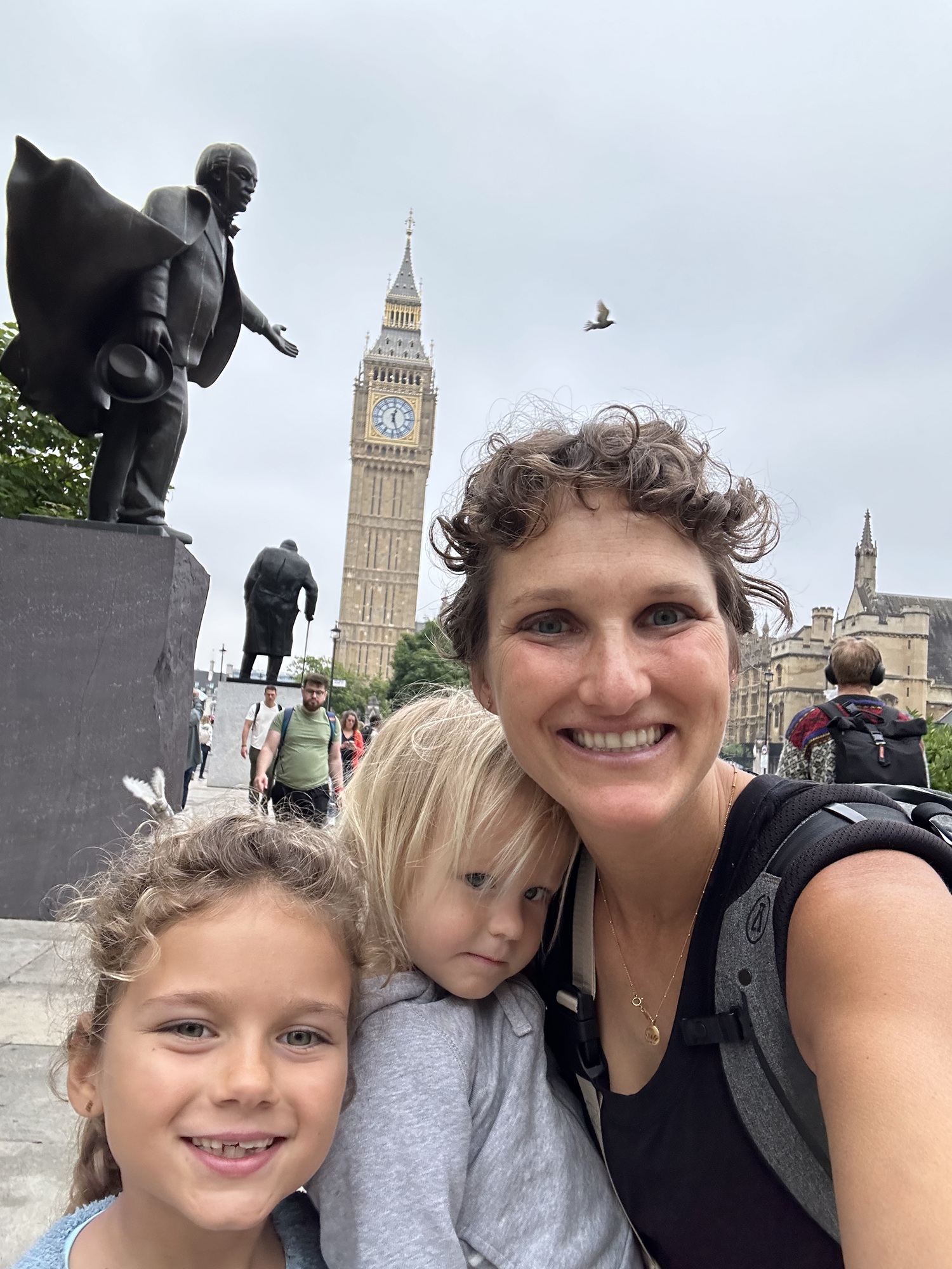 Family with kids by Big Ben in London