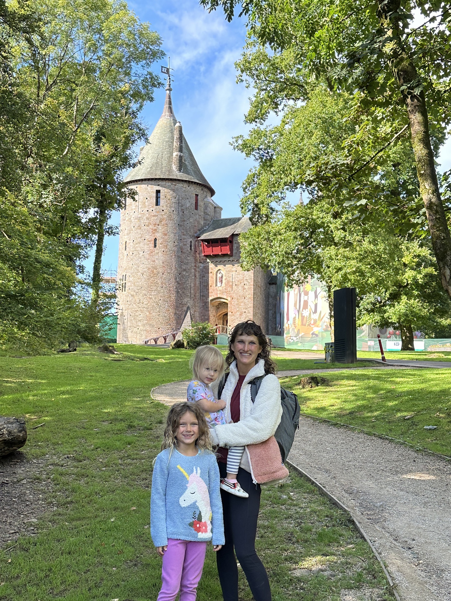 Family in the United Kingdom with jackets in the summer