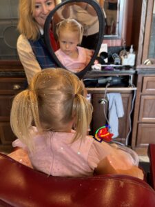 Toddlers in Magic Kingdom getting their hair cut at Magic Kingdom can get sparkles in their hair.