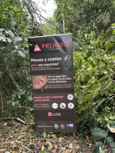 Warning sign for Coaties at Iguazu Falls